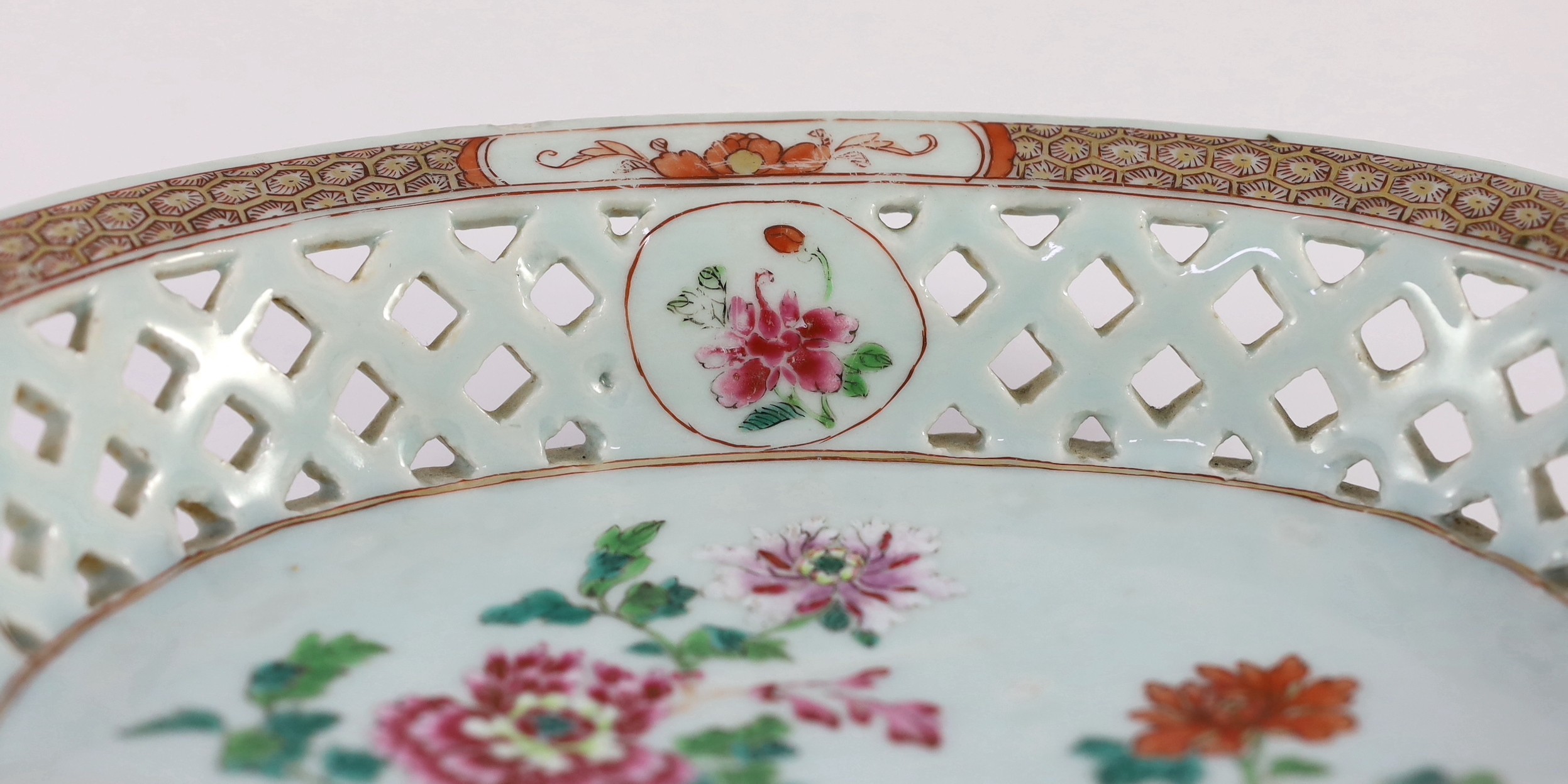 A Chinese famille rose oval two handled basket, Qianlong period, 31.5cm wide, chips to rim